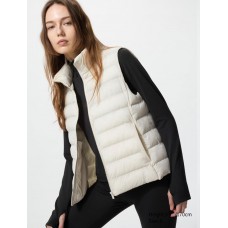 ווסט UNIQLO לנשים בצבע קרם